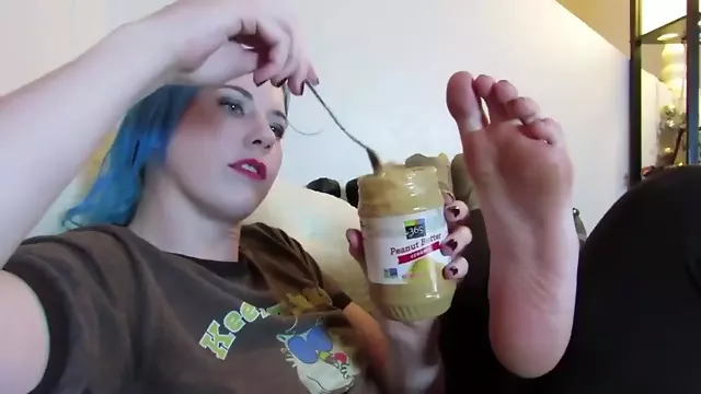 Lux Lives Licks Peanut Butter Off of Her Foot