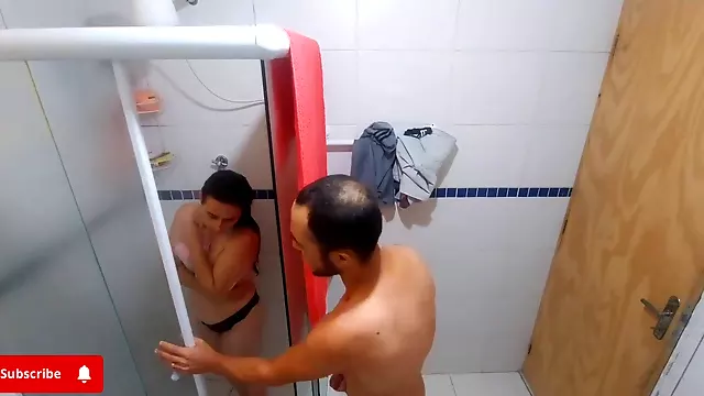 Naughty stepfather indulges in forbidden desires as he spies on his stepdaughter in the shower!