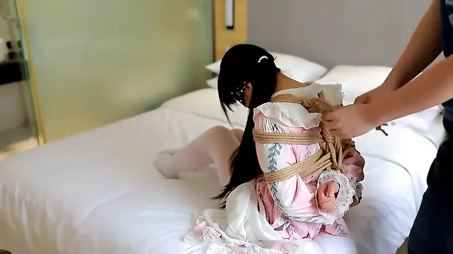 Cute chinese being bound taped hands