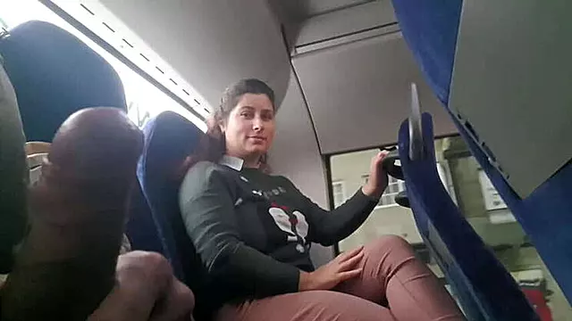 Exhibitionist Charms MILF for Handjob on Bus