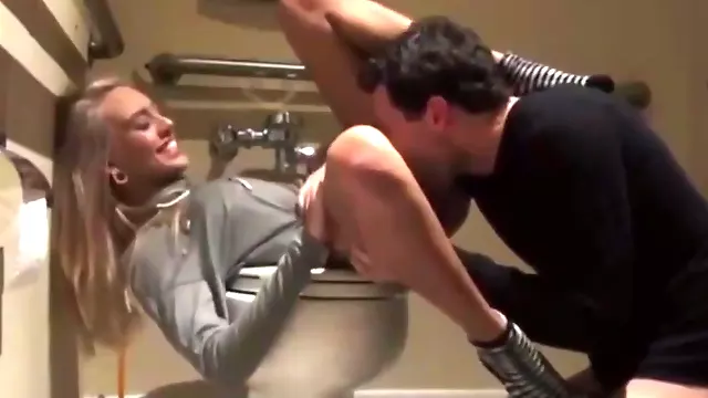 blonde teen enjoying hardcore sex with tourist in restroom