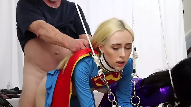 Superheroines Batgirl And Supergirl Are Captured Bound And