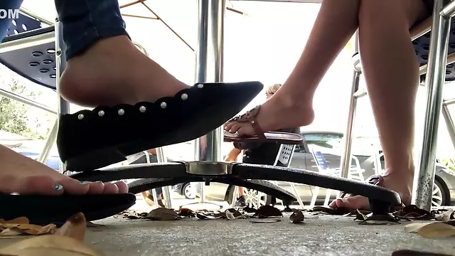 Amateur Hotties Dangling Their Shoes At The Caffee Bar In Public