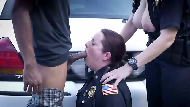 Black amn is banging two slutty female cops outside