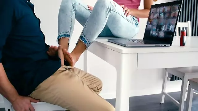 She makes him go crazy with her hands & feet 'til he explodes while having a work video call